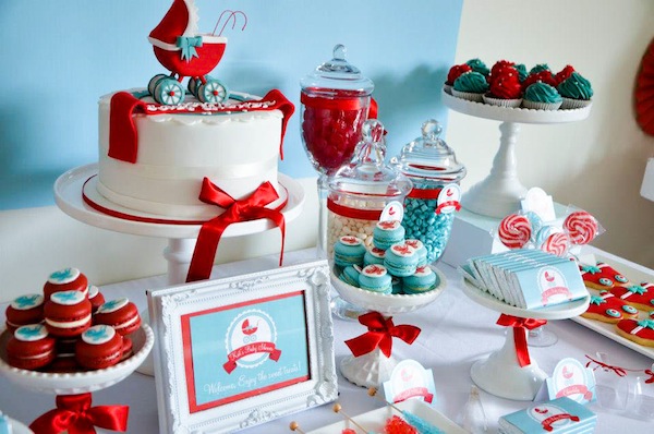 A table set up for a baby shower with goodies